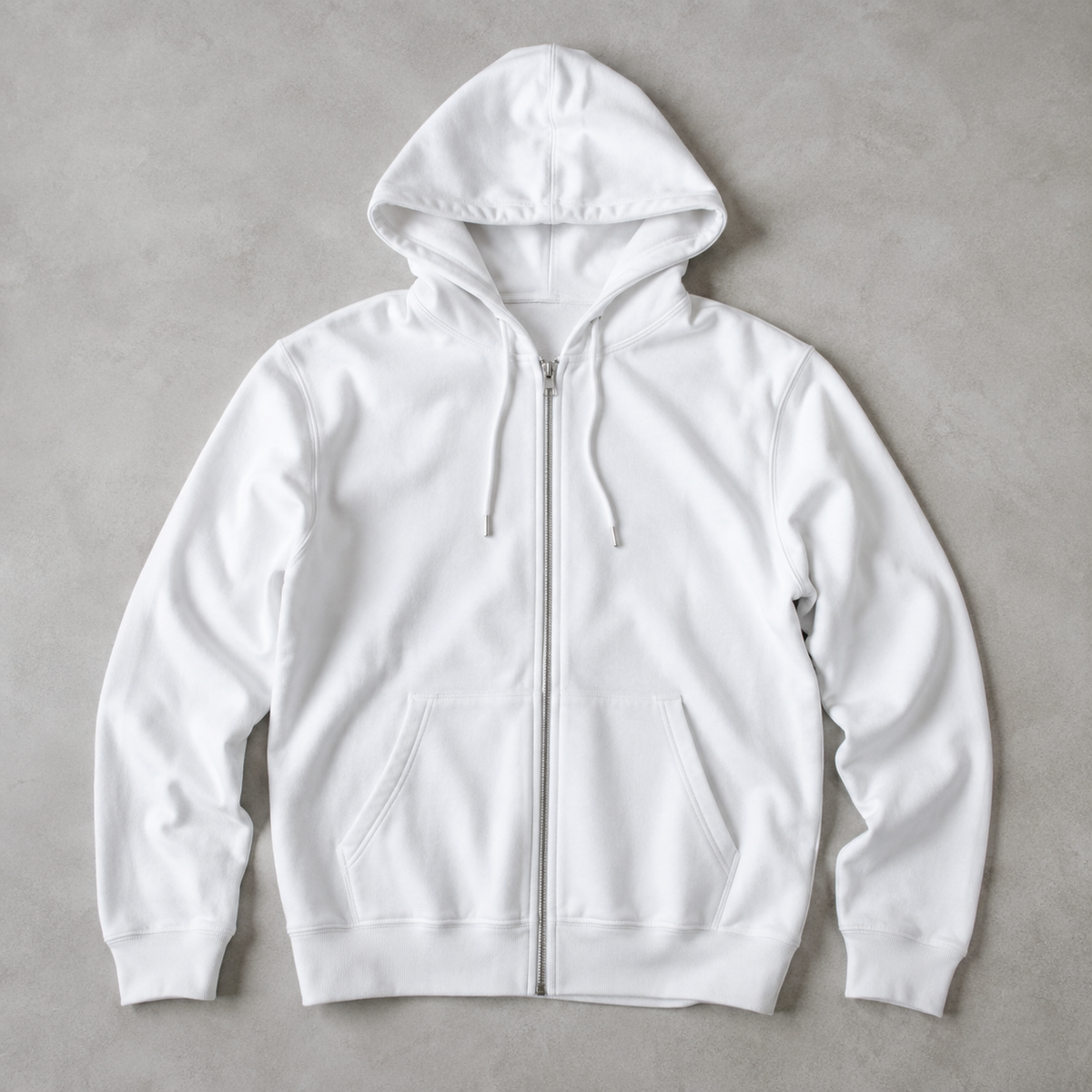 one white men's plain full zip hoodie with drawstring hood and two front pockets, sleeves neatly spread